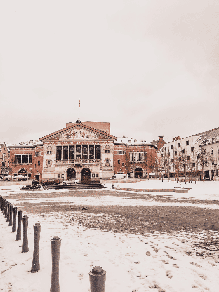 Perfect Copenhagen to Aarhus Itinerary, old stone buildings in the snow.