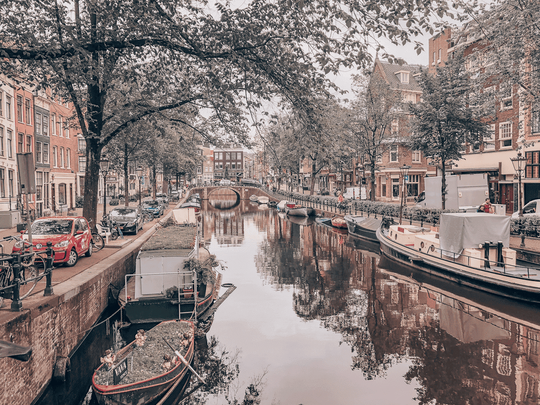 Best Solo Travel Destinations for Women, the canal and city streets of Amsterdam.