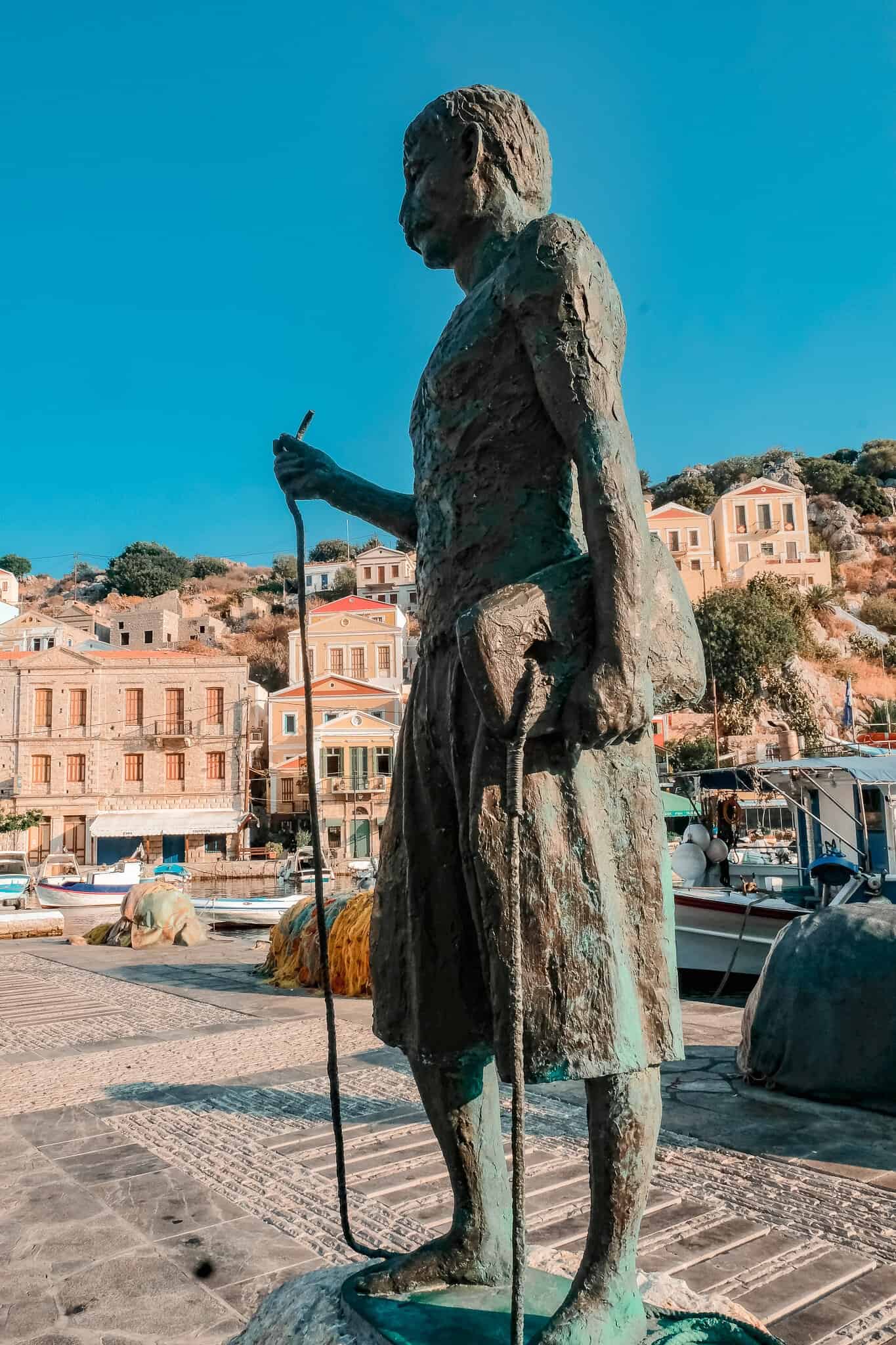Explore Symi Town A statue I found while exploring Symi, Greece.