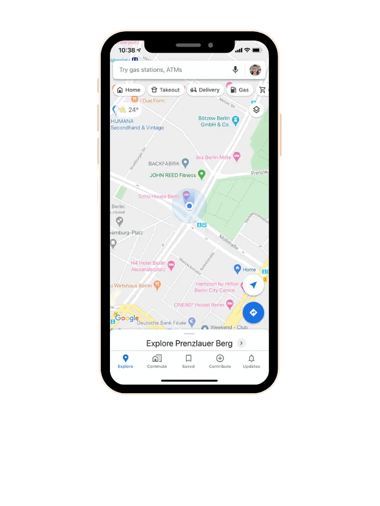 A smartphone displaying Google Maps with a focus on the Prenzlauer Berg area in Berlin, showing various icons for food, shopping, and other points of interest.