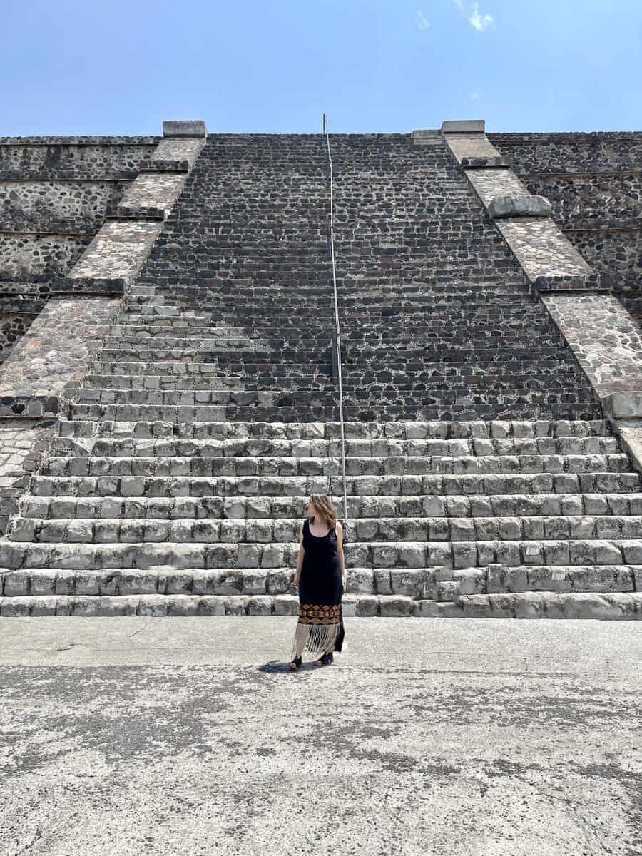 A solo woman traveling at the pyramids of Teotihuacan. Mexico City Travel Guide