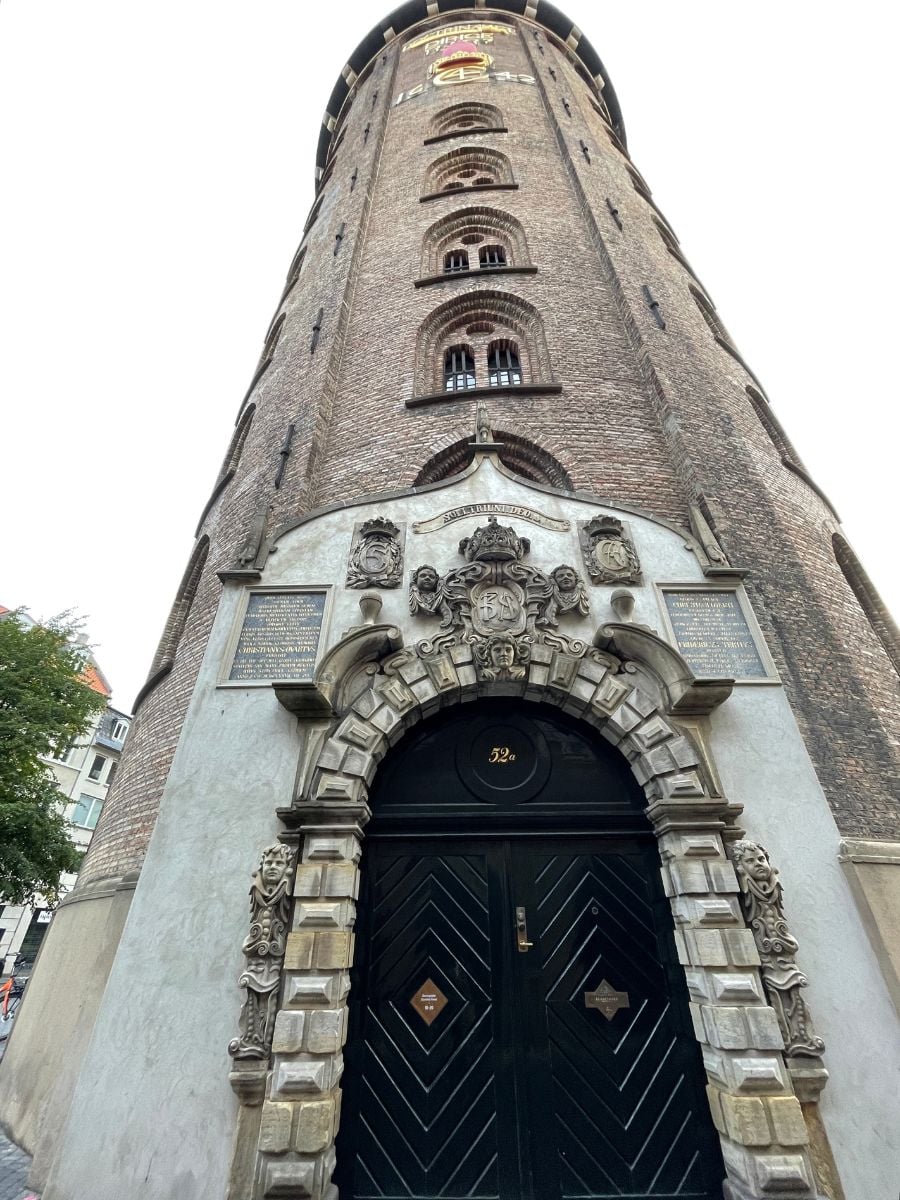 Exterior view of the Round Tower in Copenhagen from street level.