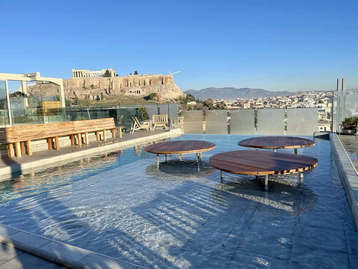 Rooftop Pool at Coco-Mat with the view of the acropolis in the background.