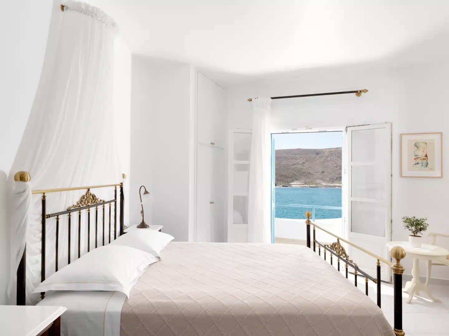 Pictures of a bed and an open door with the view of the ocean. 