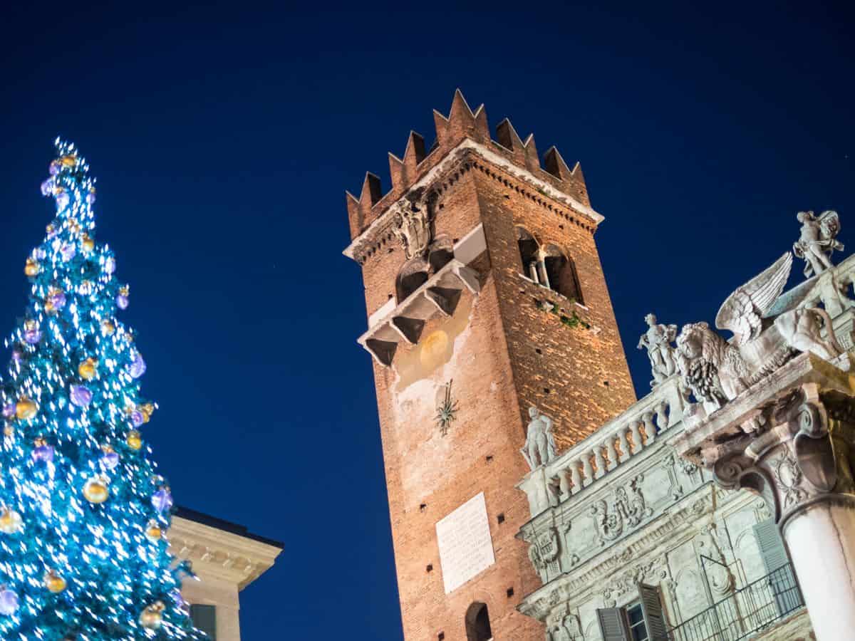 tall tower known as the Gardello Tower in Verona and christmas tree