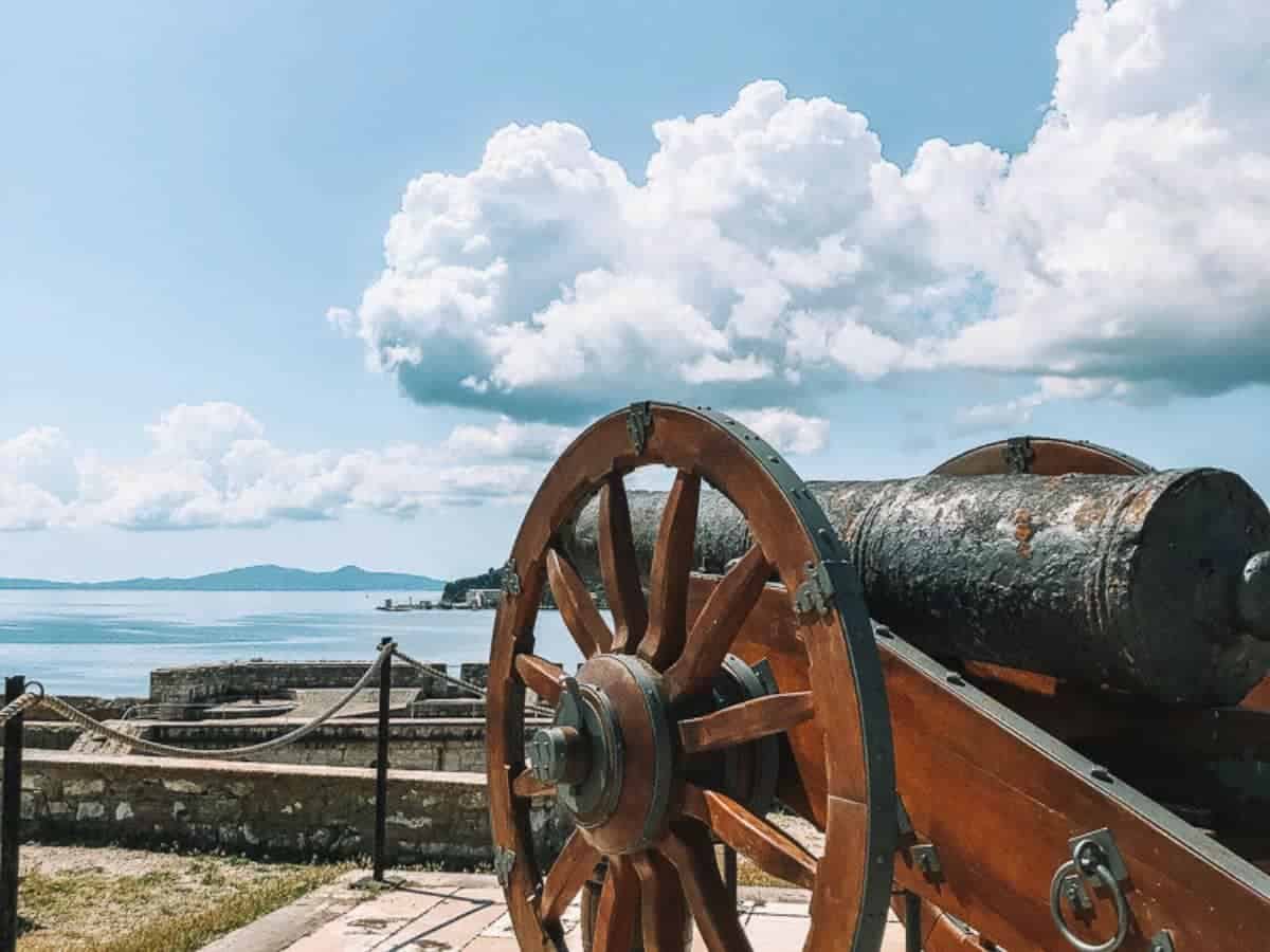 A canon in Corfu with the Sea in the background