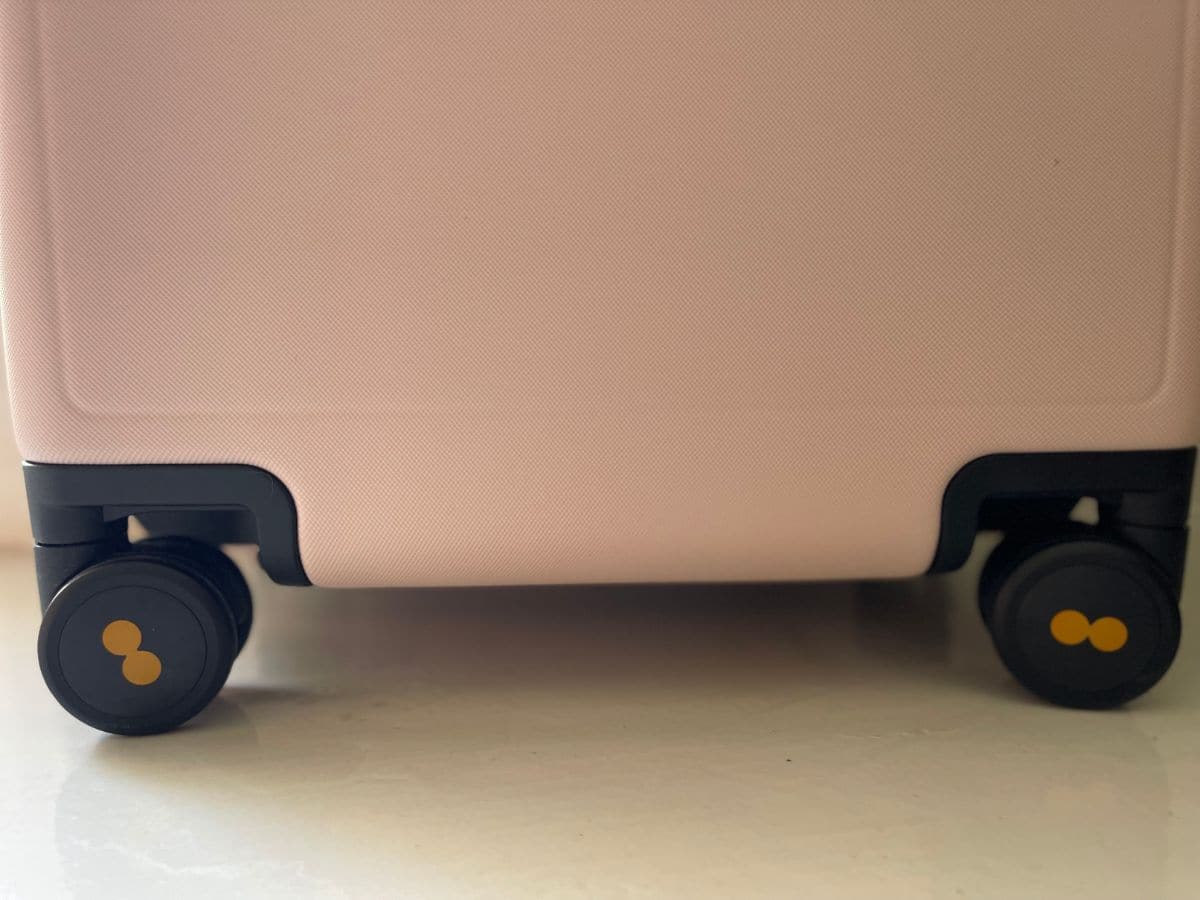 A close up of the wheels on a level8 luggage review