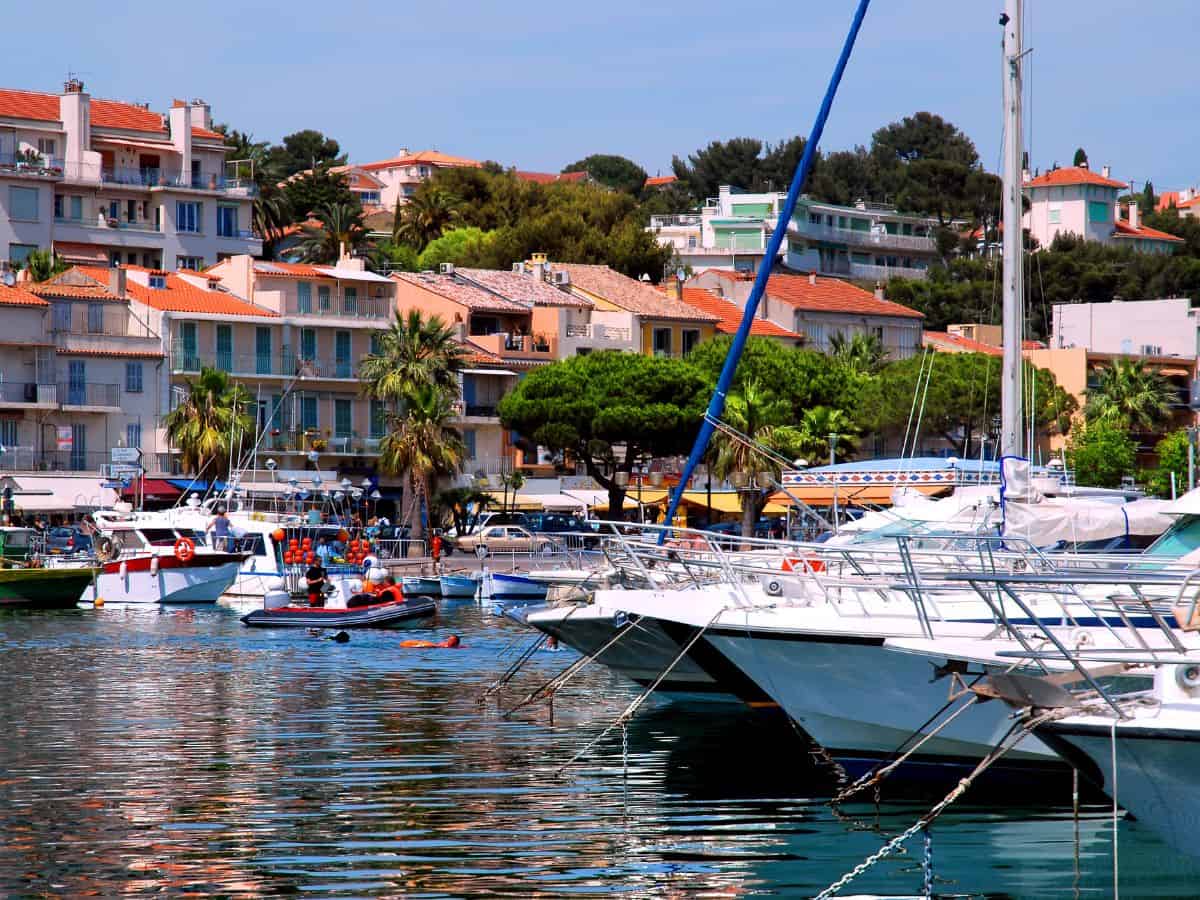 The port of Bandol. Boats in the harbour and colorful houses in the distance