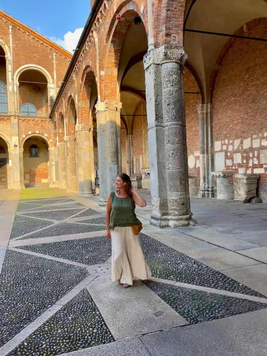 A solo woman exploring Milan and the basilica di sant'Ambrogio