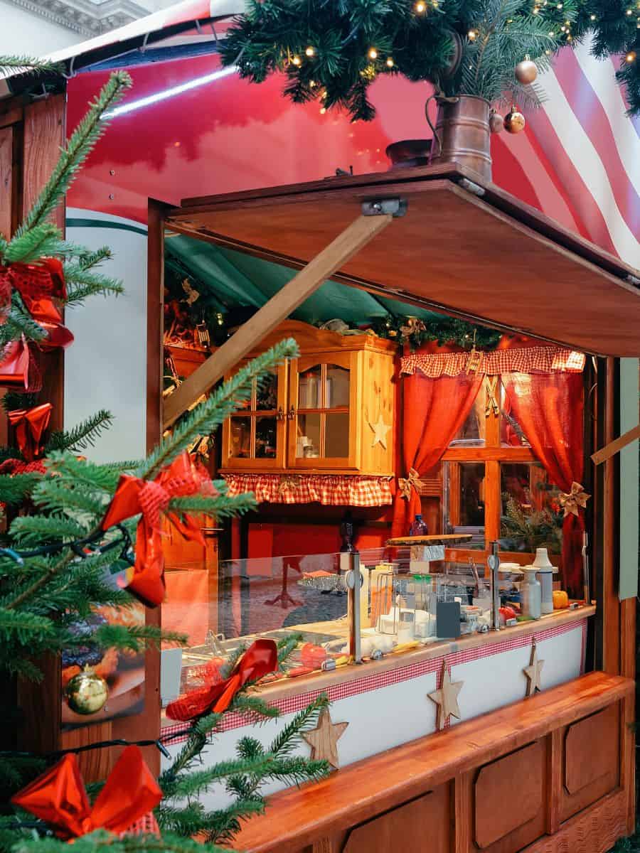 Christmas market wooden house serving food in Bologna