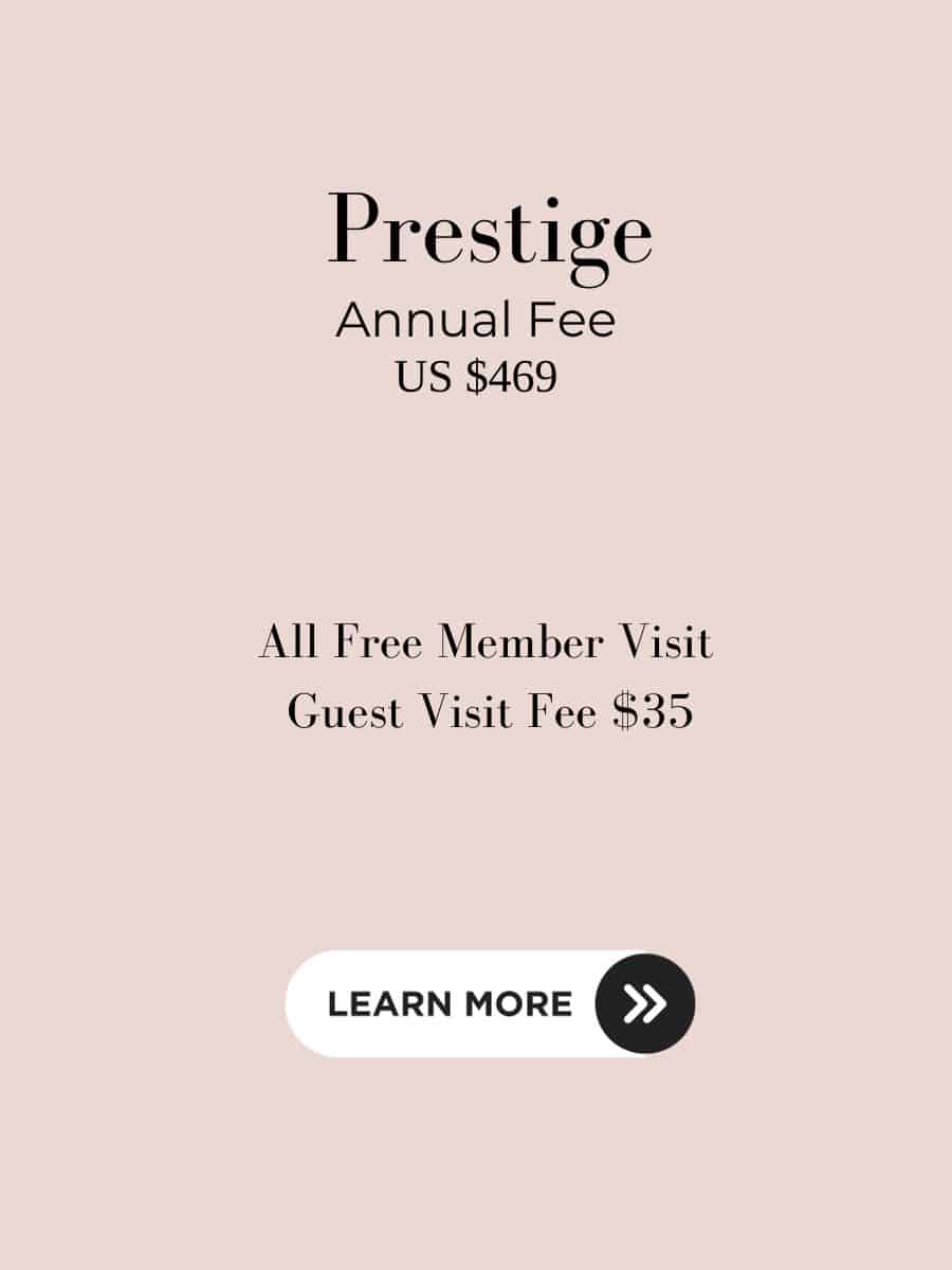 Display of Priority Pass Prestige plan featuring an annual fee of US $469 for unlimited free member visits, with a guest visit fee of $35, set against a chic pink background with a 'Learn More' button, underscoring the plan's allure for luxury and frequent travelers.