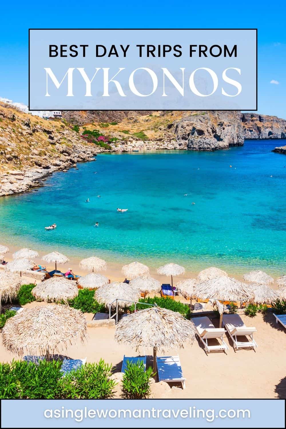 ravel blog graphic showcasing 'Best Day Trips from Mykonos' against an aerial view of a mountainous coastline with a bay embracing a clustered seaside village. The clear blue waters and rugged terrain highlight the natural beauty of the destination. 