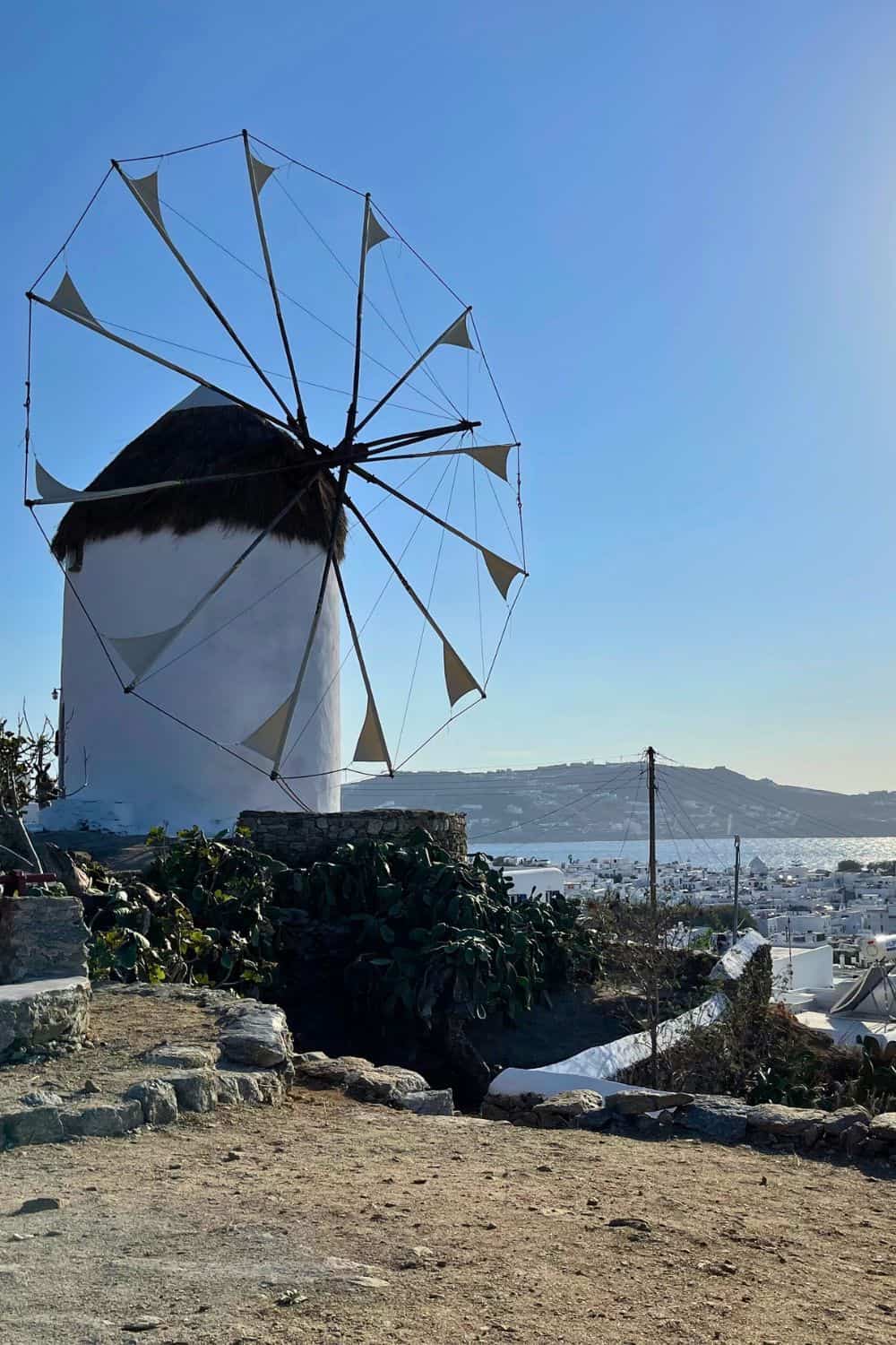 Greek Island windmill in Mykonos on a sunny day.