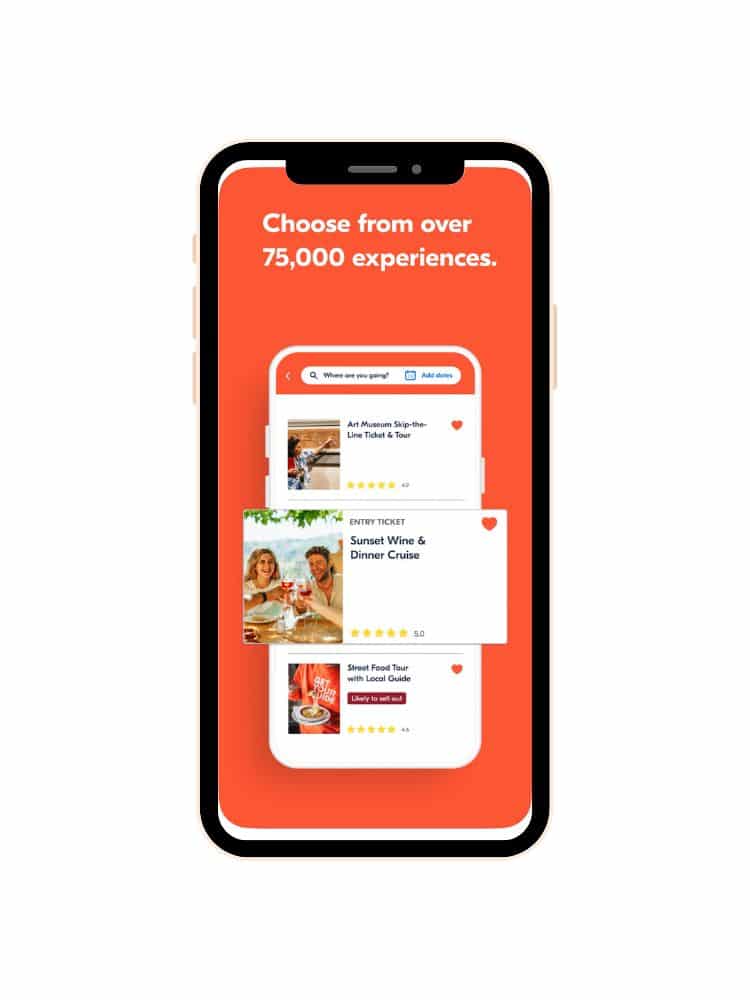 Smartphone displaying an app screen with an orange background and text stating 'Choose from over 75,000 experiences.' Below are listed tour options such as 'Art Museum Skip-the-Line Ticket & Tour' and 'Sunset Wine & Dinner Cruise.