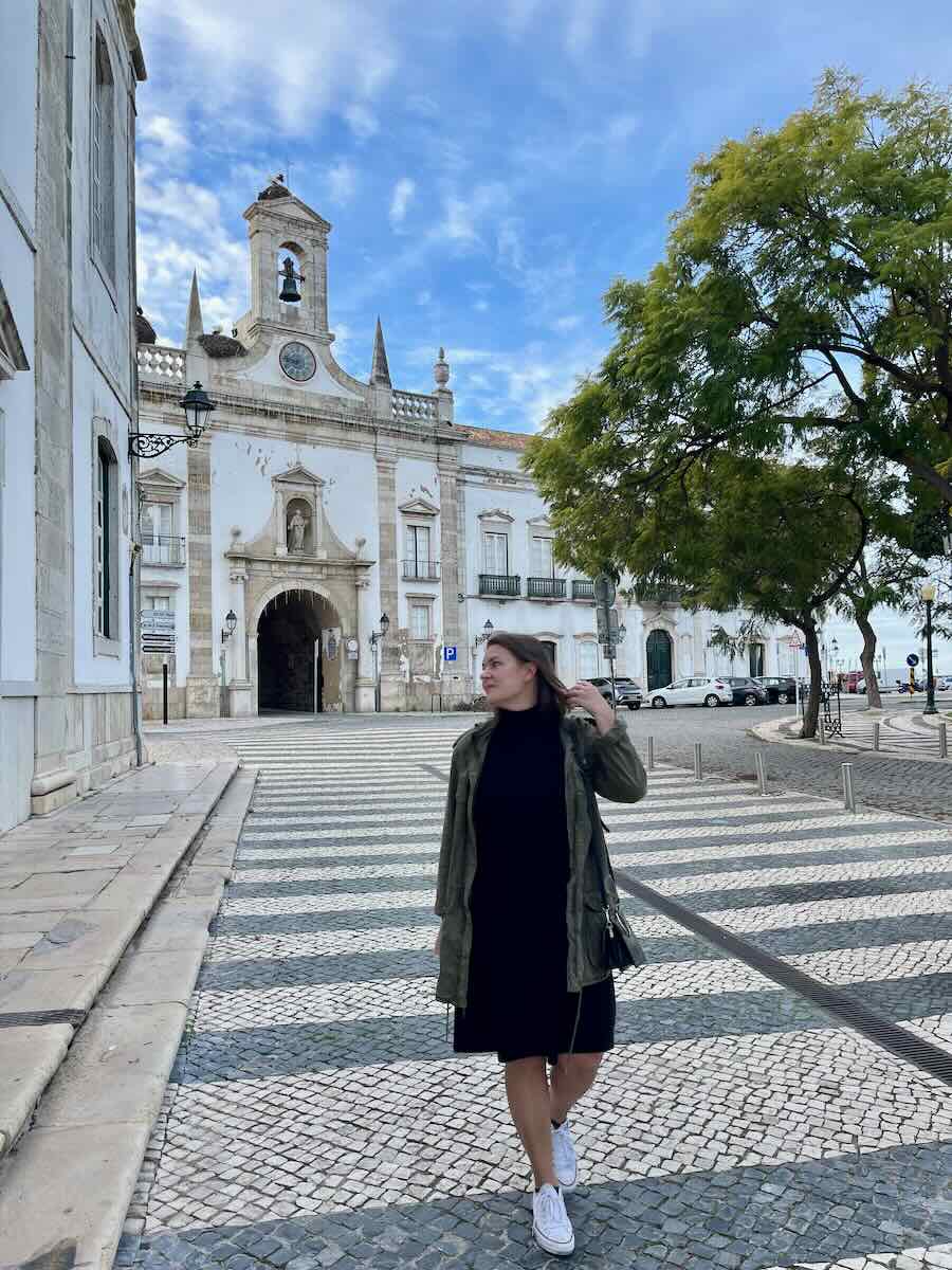 A woman walking alone in Faro