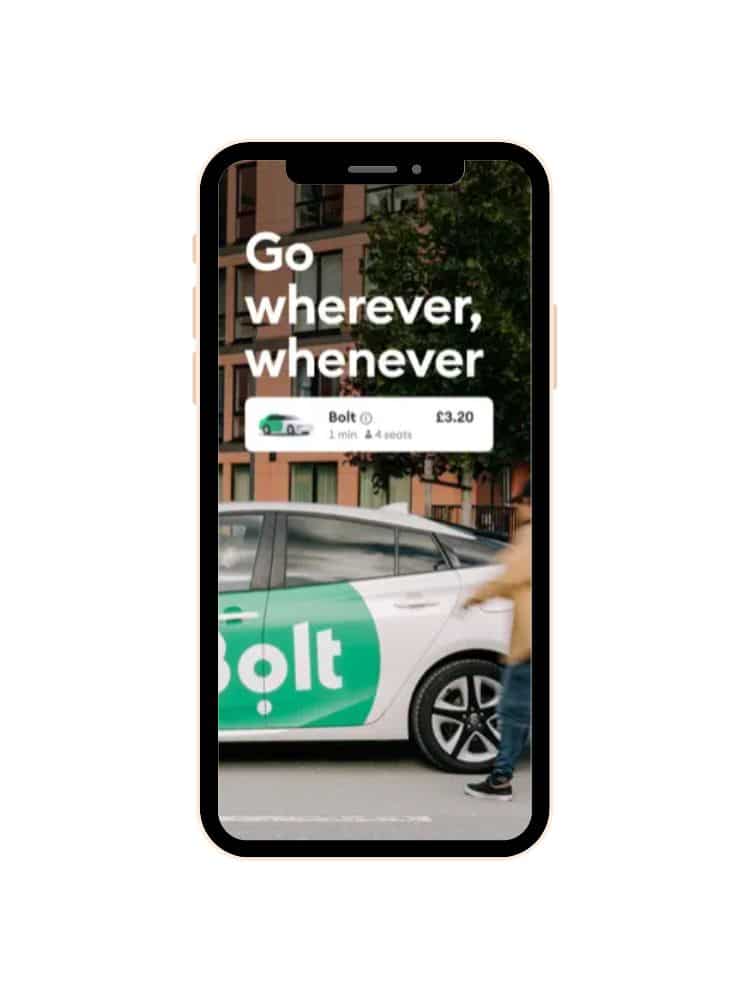 Smartphone displaying the Bolt ride-hailing app interface with an offer 'Go wherever, whenever,' showing a green Bolt car and the fare estimate.