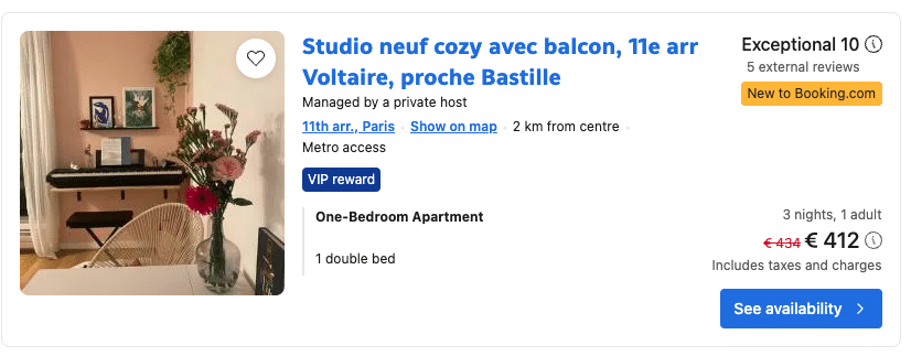 Screenshot of a hotel deal on Booking.com for a studio apartment with a balcony in the 11th arrondissement of Paris, near Bastille. The price is €412 for three nights, down from €434, and the listing shows a cozy interior with a piano and flowers
