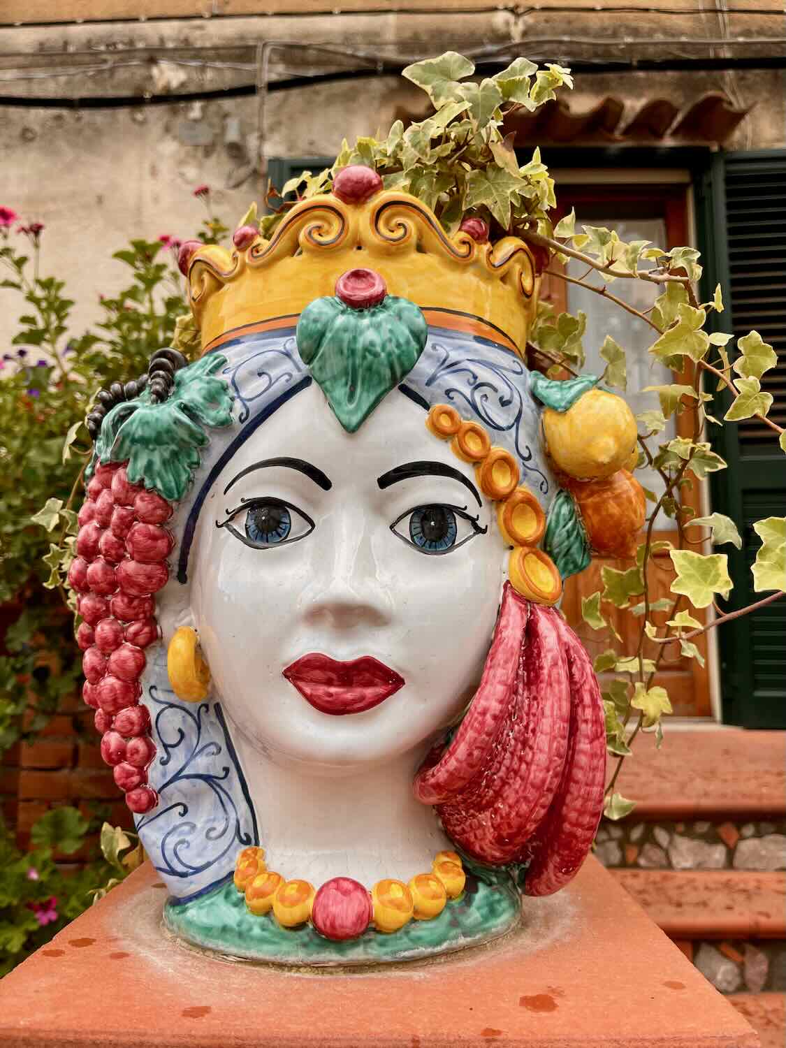 Close up of the ceramic woman head of the legend Testa di Moro