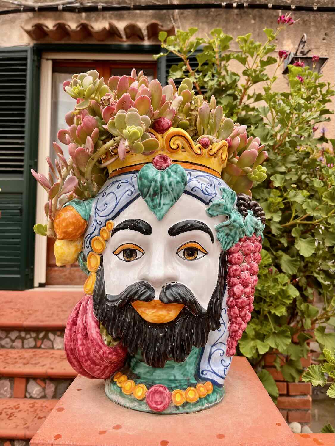 Close up of the cermanic man head of the legend of Testa di Moro.