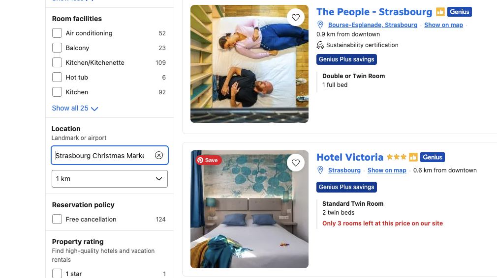 Booking.com search results for hotels near the Strasbourg Christmas Market. The People – Strasbourg is listed with a double or twin room, 0.9 km from downtown. Hotel Victoria, 0.6 km from downtown, shows a standard twin room with only three rooms left at this price.”