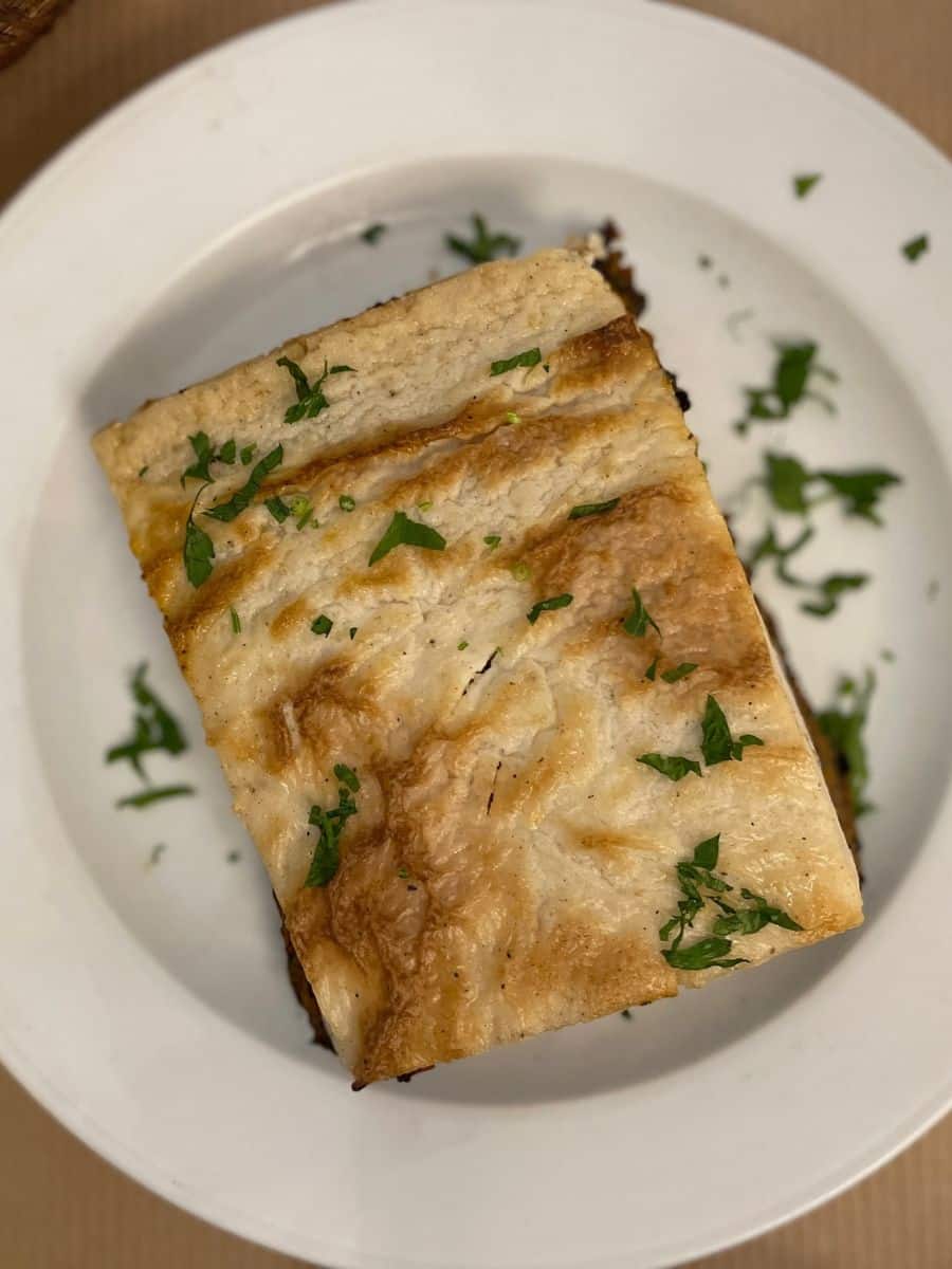 Traditional Greek moussaka with b&eacute;chamel sauce served at a local restaurant on an Athens food tour.