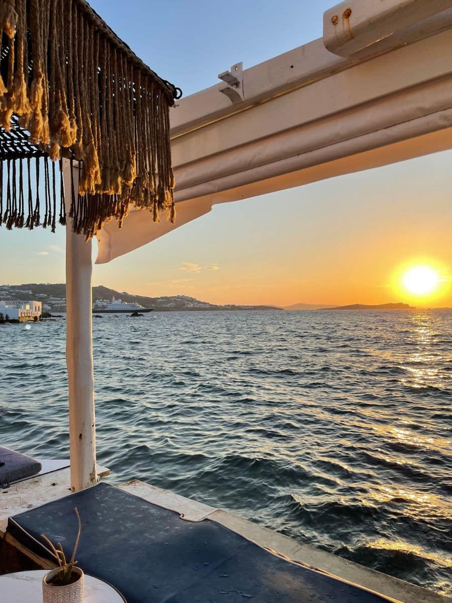 Sunset view over the Aegean Sea from a seaside terrace in Mykonos