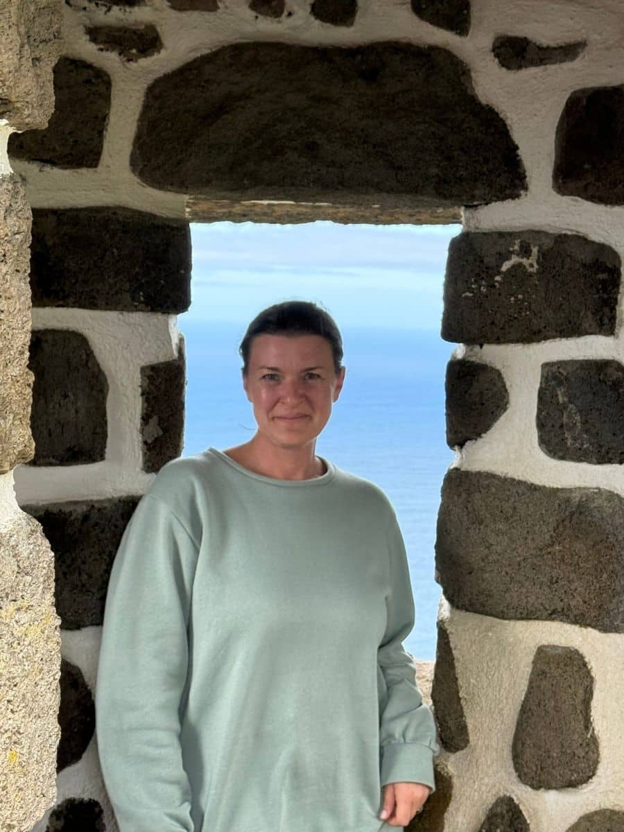 Solo traveler at scenic viewpoint in S&atilde;o Miguel, Azores