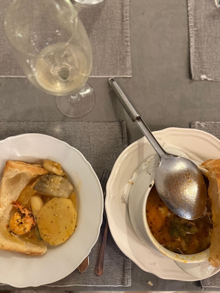 Traditional Azorean seafood stew served in bread at one of the best restaurants in Ponta Delgada, S&atilde;o Miguel
